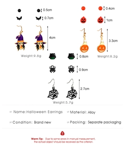 Detail of Halloween earrings set showing alloy pumpkin, bat and witch charms