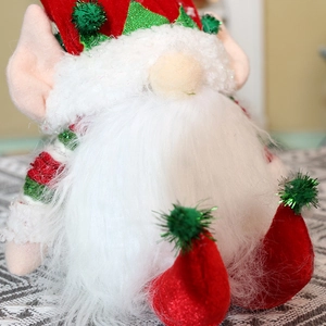 Lighted Christmas gnome plush with red knit hat and long white beard for holiday decor