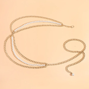 Detail view of multi-layer gold chain belt with elegant pearls and lobster clasp