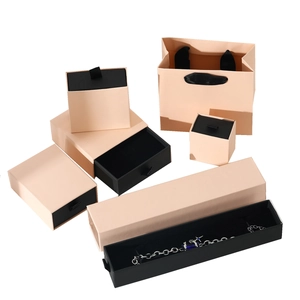 Elegant peach pink jewelry drawer box set with matching paper gift bags and black velvet lining