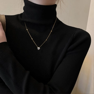 18K gold plated stainless steel necklace with white heart zircon pendant on model