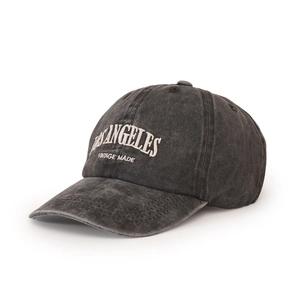 Close-up of Los Angeles vintage embroidery on a washed grey cotton baseball cap