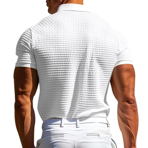 Macro shot of the white waffle textured fabric on a men's slim fit polo shirt back