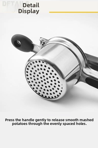 Detail showing high-quality stainless steel mesh and lever handle of the potato ricer