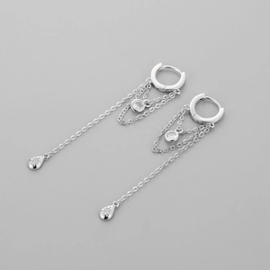 Detail view of S925 silver fringe earrings with long chains and sparkling zircon stones