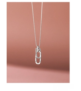 Detail of S925 sterling silver interlocking rings necklace with Forever engraving