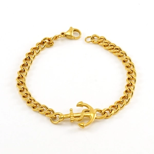 Detailed view of golden Cuban link chain bracelet featuring a unique anchor toggle clasp