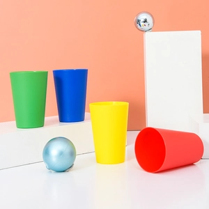 Colorful stacking cups toy for toddlers featuring red, blue, yellow, and green durable plastic