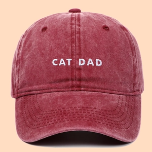 Classic washed cotton baseball cap in dark red with white CAT DAD embroidery