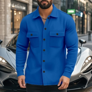 Close-up of royal blue men's jacket featuring front flap pockets and black buttons