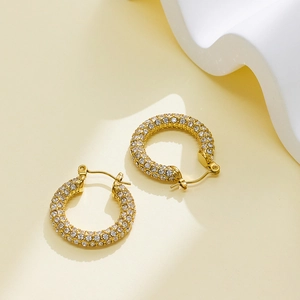 Detailed close-up of 18k gold plated stainless steel hoop earrings with pavé zircon stones