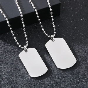 Polished stainless steel double dog tag pendant necklace with round bead chain on black