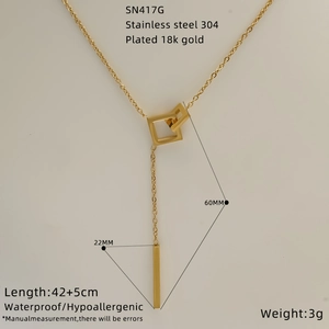 Detail of 18K gold plated stainless steel Y-necklace with geometric pendant elements