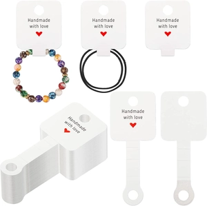 Foldable white paper jewelry display cards with Handmade with love print and red heart
