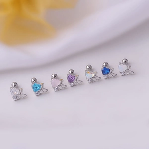 Set of 7 colorful heart-shaped cubic zirconia stud earrings with butterfly accents