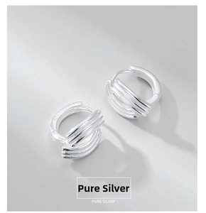 Detail view of S925 sterling silver multilayer hoop earrings with pure silver hallmark