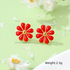 Detailed macro view showing red daisy enamel earrings with 1.2cm size and 2.3g weight specs