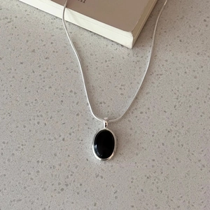 Minimalist s925 silver necklace with oval black onyx pendant on sleek snake chain