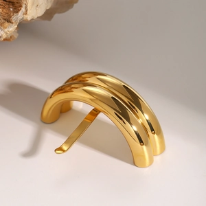 Polished gold stainless steel hair fork with elegant curved double-layer design