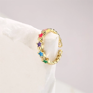 Adjustable gold link ring featuring five colorful zircon stars on a white stone base