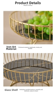 Detail of gold iron frame and black marble texture glass tray for tiered snack storage