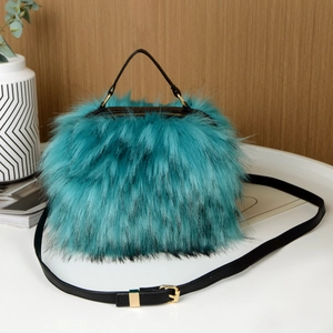 Faux raccoon fur plush handbag in teal blue with black handles and gold hardware accents
