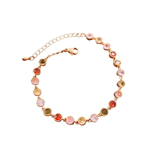 Bracelet plaqué or rose avec zircons ronds colorés et chaîne d'extension ajustable
