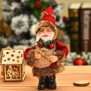 Standing Santa Claus doll figurine in red outfit with berries and cozy holiday backdrop