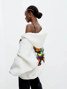 Detail of colorful teddy bear graffiti print on the back of white oversized hoodie
