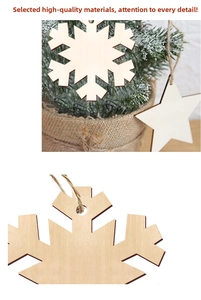Macro detail of laser-cut wooden snowflake ornament with rustic jute rope for Christmas tree