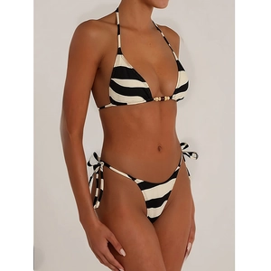 Two-piece black and white striped bikini set with gold beads and side-tie bottoms