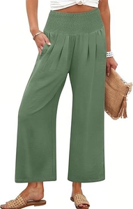 Détail du pantalon large vert olive à taille haute élastique et tissu plissé texturé
