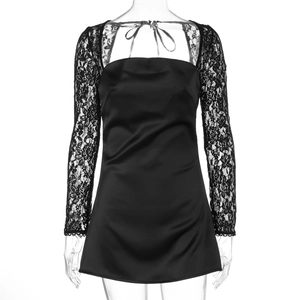 Detail of elegant black lace long sleeves and satin fabric texture on A-line mini dress