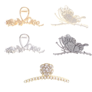 Elegant gold and silver metal hair claws with rose, butterfly and camellia designs