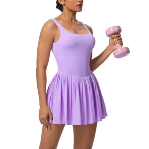 Lavender purple tennis dress with pleated skirt and built-in shorts for fitness