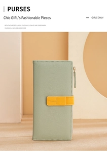 Close-up of litchi texture leather wallet in bean green with contrast yellow strap detail