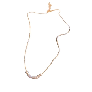 French style gold pearl necklace with eight elegant champagne pearls on thin chain