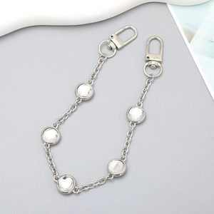 Silver metal chain accessory with five round crystals and dual rotating spring clasps