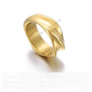 Detail view of 8mm golden irregular wavy ring showing cast stainless steel texture