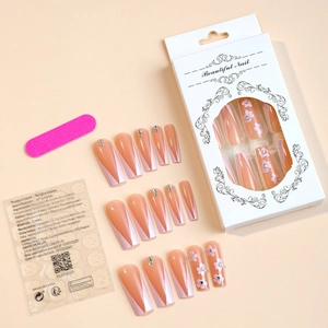 Detail of long coffin press-on nails with 3D pink flowers and rhinestones set