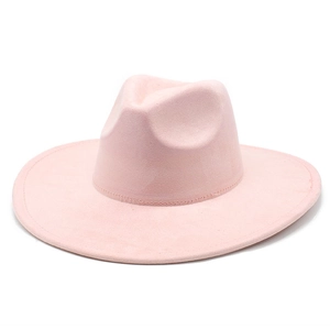 Detailed view of the soft pink wide-brimmed felt fedora hat with a classic pinched crown