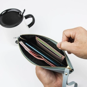 Light blue faux leather long wallet with multi-card slots and a spacious phone compartment