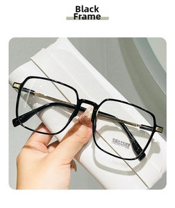 Close-up of black square eyewear with anti-blue light lenses and metal temple detail