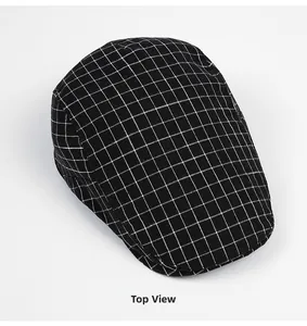 Top view showing the classic black and white checkered texture of the flat newsboy cap