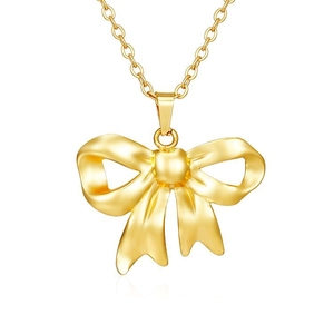 Detailed view of elegant gold bow pendant necklace with shiny metallic finish and cable chain