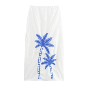 Vacation style white two-piece set featuring blue coconut tree embroidery and A-line skirt
