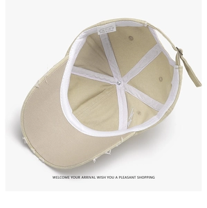 Detail view of 100% cotton baseball cap interior with vintage distressed brim and branding