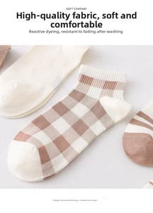 Detail of soft breathable cotton socks with bear embroidery and ribbed cuff design