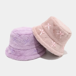Faux fur bucket hat with ribbon bows for women, warm winter plush fisherman cap