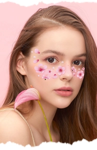 Detail of pink cherry blossom and pearl face stickers for party makeup and festive looks